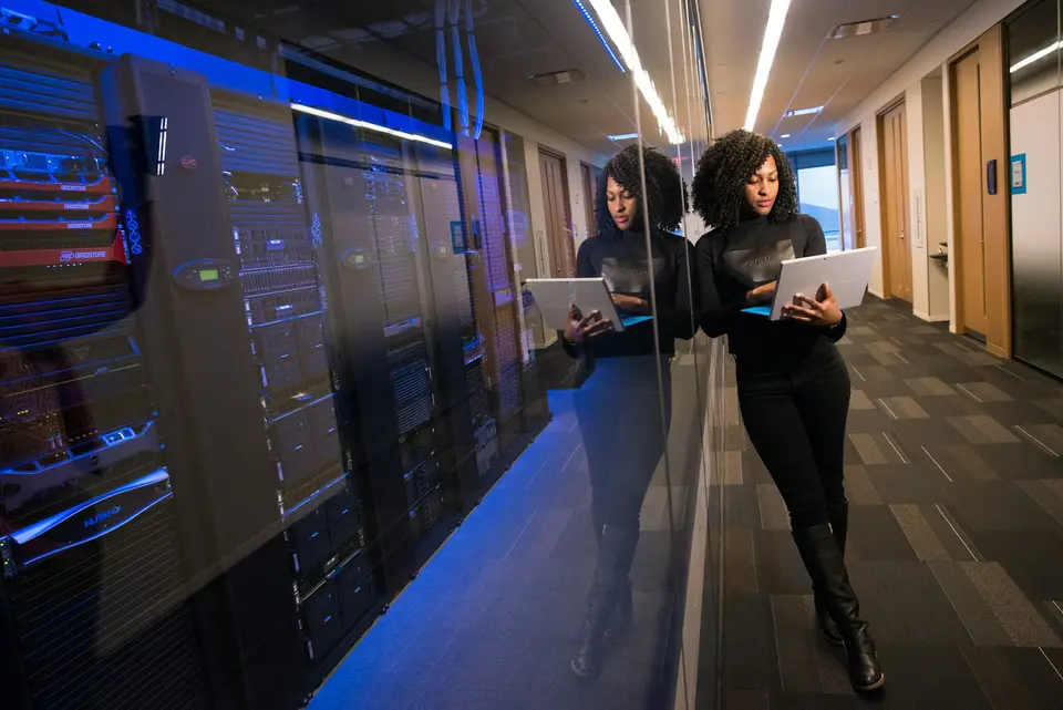 Server racks lining a data centre aisle